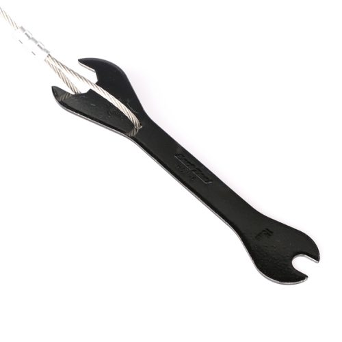 Black spanner for Cyclehoop Repair Stand attached to a metal wire