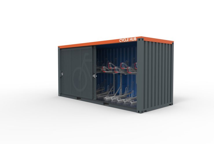 View of Container Cycle Hub with open sliding gate showing 24 secured parking spaces.