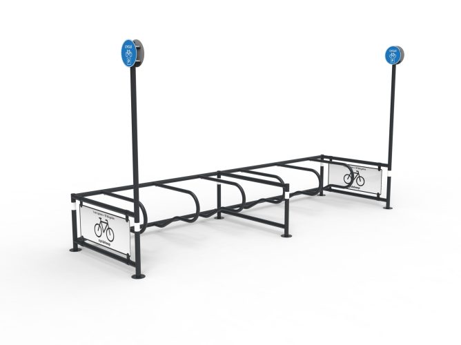 A side view of an empty Cyclehoop Mobility Corral with clear signage to indicate bike parking